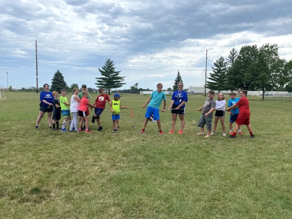 Kids posing before playing tug of war